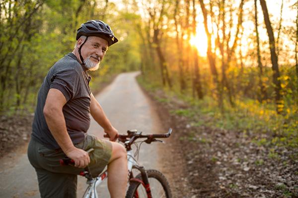 elder gentleman riding a bike